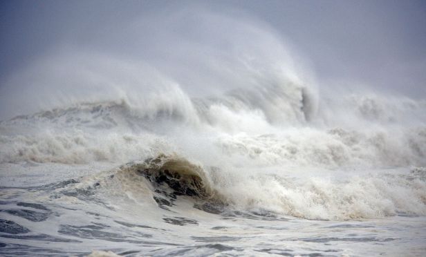 Waves break ahead of Hurricane Michael in Panama City Beach, Florida