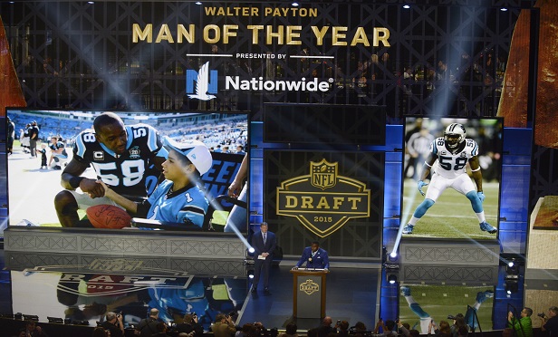The 2014 Walter Payton Man of the Year award winner Carolina Panthers linebacker Thomas Davis speaks during the first round of the 2015 NFL Football Draft. (Photo: AP Photo/Paul Beaty)