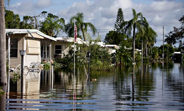 Flood water surrounds mobile homes