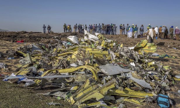 Wreckage is piled at the crash scene of an Ethiopian Airlines flight crash