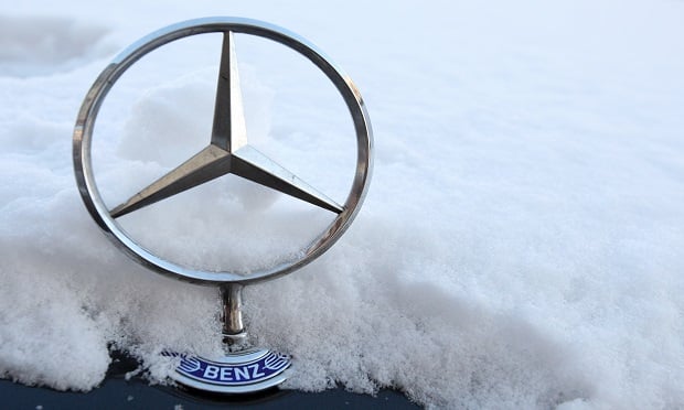 Increasingly turbulent weather in Germany's south is just another sign of Europe's largest economy getting ruffled by climate change. Here, a Mercedes-Benz star logo stands on a snow-covered automobile in Berlin, Germany. (Photographer: Adam Berry/Bloomberg News)