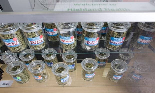 Canisters of medical marijuana for sale in the cases inside Highland Health, a medical dispensary and wellness center in Denver, Colorado, U.S., on Wednesday, Nov. 4, 2009. (Photo: Matthew Staver/Bloomberg)