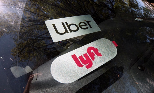 Gig economy workers who are classified as independent contractors have been squeezed out of the workers' compensation system. (Credit: Daniel Dror/Shutterstock) 