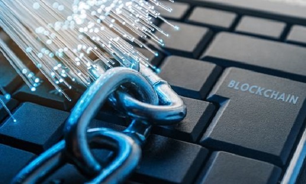 Blockchain-based processes could save claims handlers nearly 1.5 million hours each year. (Photo: Alexander Yakimov/Shutterstock)