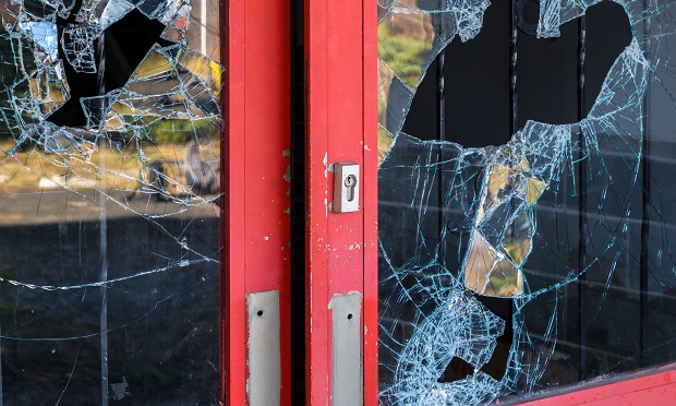 Commercial insurance policy Theft Exclusion Endorsements commonly exclude damage caused by theft, but agree to cover loss or damage that occurs due to looting at the time and place of a riot or civil commotion; or building damage caused by the breaking in or exiting of burglars. (Shutterstock) 