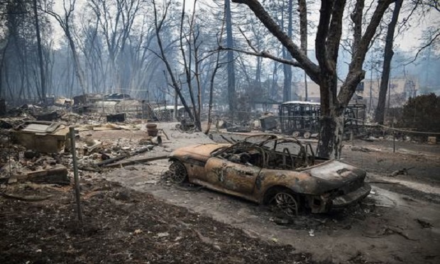 A burned-out vehicle stands during the Camp Fire in Paradise, California, U.S., on Tuesday, Nov. 13, 2018. (Photo: David Paul Morris/Bloomberg)