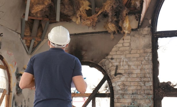 Adjuster inspecting a fire loss.