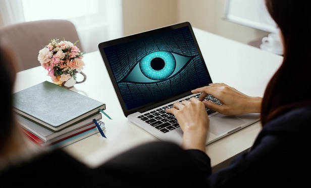A large eye on a computer screen.