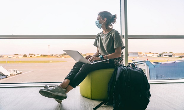 Most business travelers are anxious to get back on the road to boost relationships with clients and colleagues, according to a recent Chubb survey. (Photo: ©olezzo via Adobe Stock)