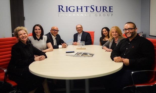RightSure provides P&C and life insurance products in 42 states. The agency has appointments with more than 70 different insurance partners and is a top agency for Safeco and Progressive. Here, RightSure leaders are gathered in the conference room of the firm's offices in Tucson, Ariz. (Provided photo)