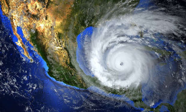 Hurricane approaching the American continent visible above the Earth. Elements of this image furnished by NASA.