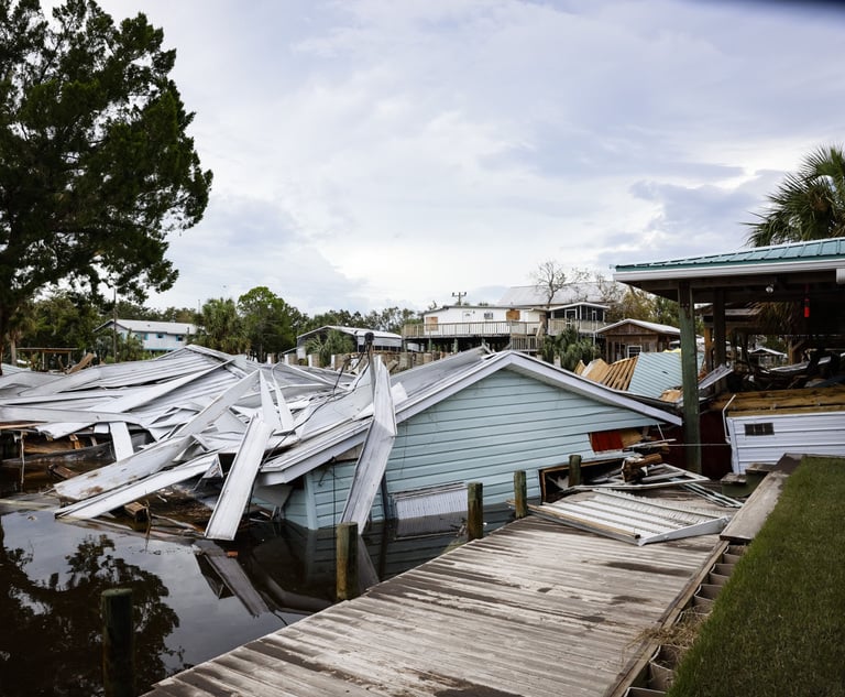 The Florida insurance market reportedly suffers from rampant fraud and misuse of assignment of benefits (AOB). In this photo, debris from Hurricane Idalia litters a canal in Horseshoe Beach, Fla. (Credit: Eva Marie Uzcategui/Bloomberg)