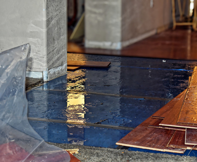 Water damaged wood flooring in a home.