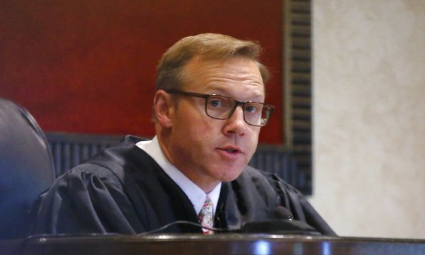 Judge Thad Balkman speaks during Oklahoma's case blaming consumer products giant Johnson & Johnson and its subsidiaries for the state's opioid drug crisis, in Norman, Okla. Closing arguments are expected to begin on Monday, July 15, 2019. 