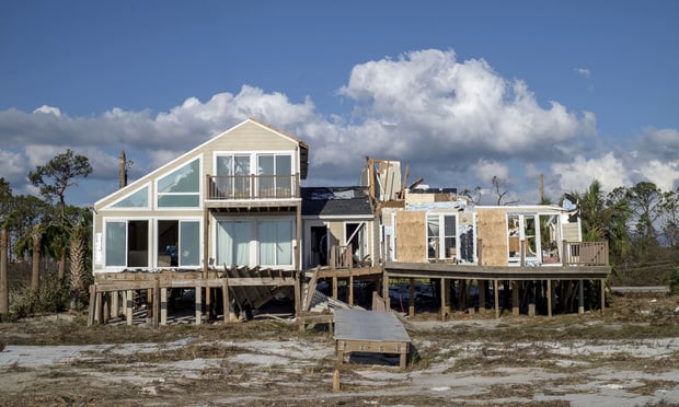 A beach house stands damaged after Hurricane Michael hit in Mexico Beach, Florida, U.S. on Oct. 11, 2018. Photo: Zack Wittman/Bloomberg.