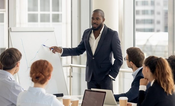 Man leading training meeting