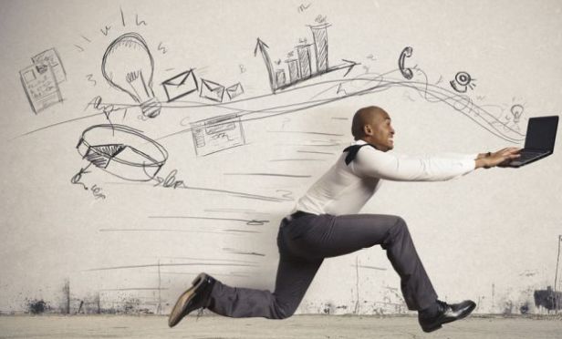 Man running with laptop