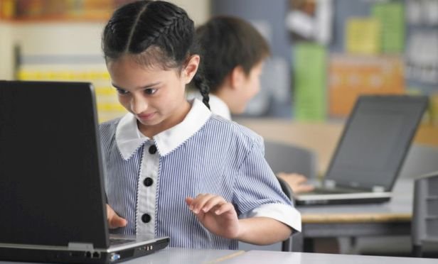 girl working on a laptop