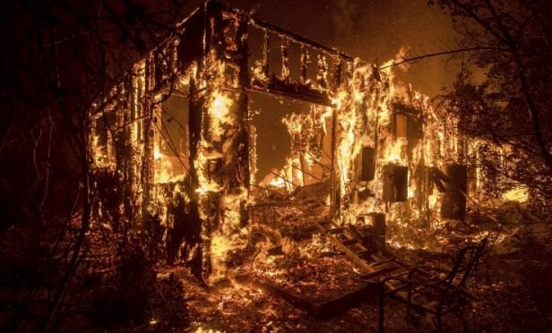flaimes consume a house