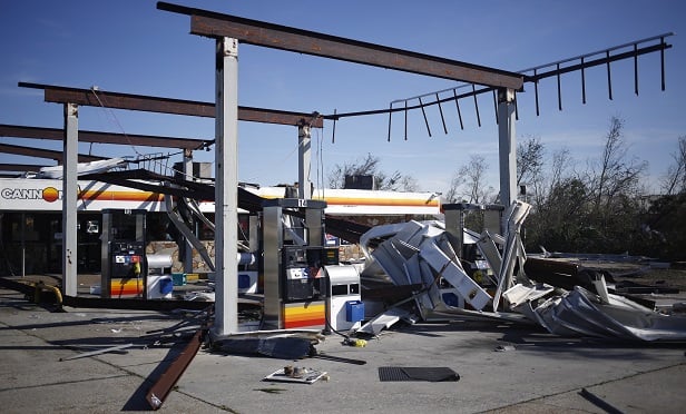 In order to trigger business income coverage, there must be direct, physical loss or damage to the property caused by a covered cause of loss, such as windstorm or hail. This gas station in Panama City, Fla., took just such a beating during Hurricane Michael. (Bloomberg)