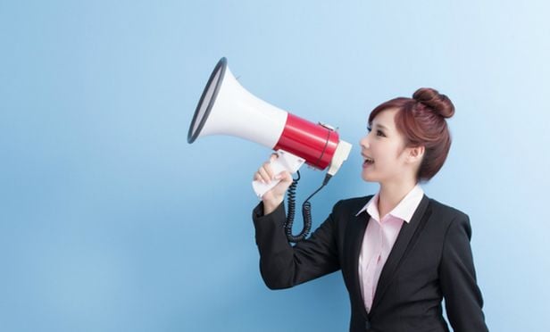 Woman with bullhorn speaker