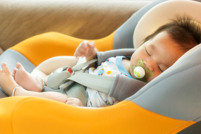 Baby sleeping in car seat