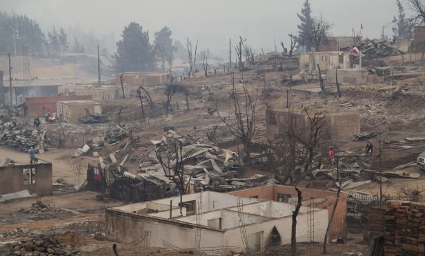 Homes destroyed by wildfires in Chile