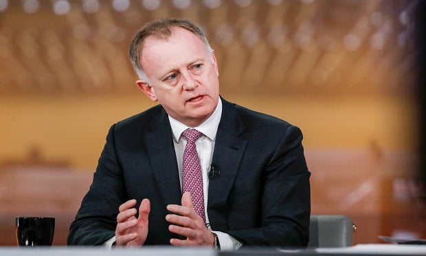 John Neal, chief executive officer of Lloyd's of London Ltd., gestures while speaking during a Bloomberg Television interview in London, U.K., on Wed., March 27, 2019. (Photographer: Luke MacGregor/Bloomberg)
