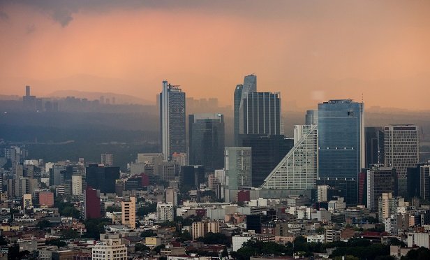 The city has a long-standing policy that restricts the number of cars on the road when air-quality indicators hit certain levels. (Photo: Brett Gundlock/Bloomberg)