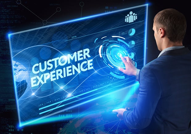 Man-at-interactive-computer-screen-customer-experience