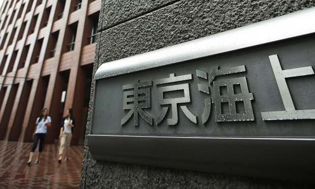 Signage for Tokio Marine & Nichido Fire Insurance Co. is displayed outside the company's headquarters building in Tokyo, Japan. (Photo: Kiyoshi Ota/Bloomberg)