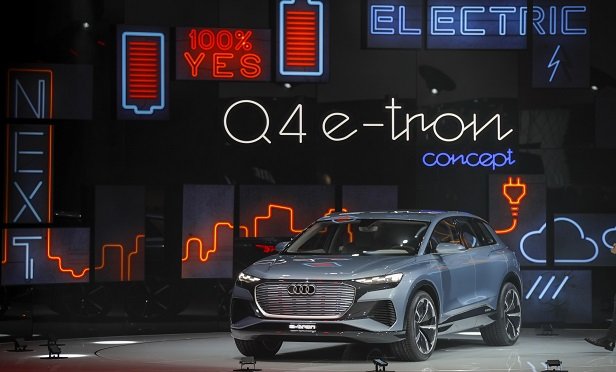 An Audi Q4 e-tron concept electric sport utility vehicle (SUV), produced by Audi AG, sits on display on the opening day of the 89th Geneva International Motor Show in Geneva, Switzerland, on Tuesday, March 5, 2019. (Photo: Stefan Wermuth/Bloomberg)
