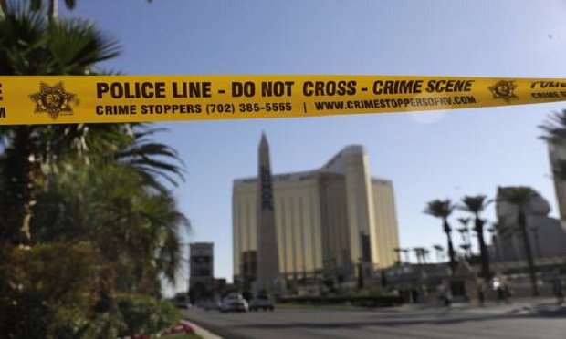 In this Oct. 4, 2017, file photo, part of Reno Ave. near South Las Vegas Blvd is blocked with police tape in the aftermath of a mass shooting in Las Vegas. (Photo: Marcio Jose Sanchez/AP)