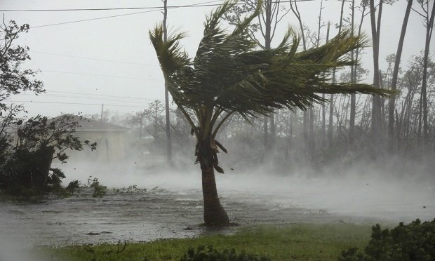 A road is flooded during the passing of Hurricane Dorian in Freeport, Grand Bahama, Bahamas, on Monday, Sept. 2, 2019. (AP Photo/Tim Aylen)