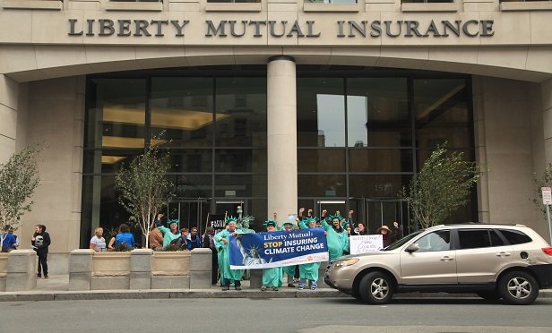 According to RAN, Liberty Mutual is a top global insurer of coal, oil and gas. Their white paper says the company invests more than $6.6 billion in fossil fuel companies, including $1.5 billion in thermal coal. (Photo: Courtesy of Rainforest Action Network/Anton A.) 