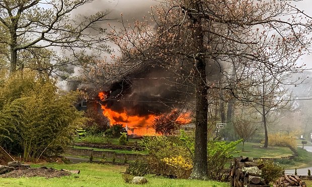 House fire devastating U.S. District Judge Gary Brown's house in Brookhaven, Long Island. (Photo: ALM Archives) 