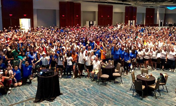 Group of GKTW volunteers in hotel ballroom