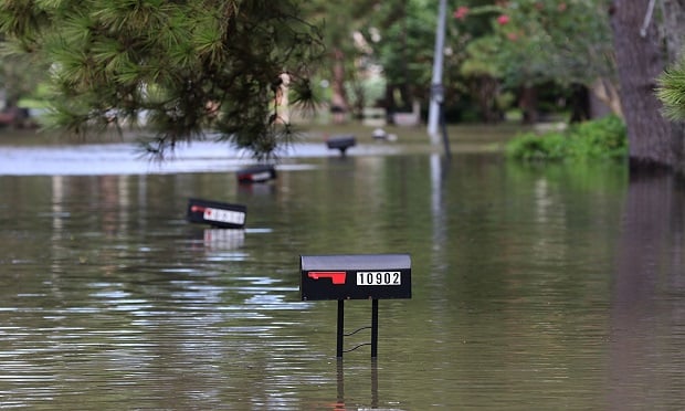 Mailboxes stick out from flood waters in Lakeside Estate in Houston, Texas on August 30, 2017. (Photo: Getty Image/AFP)