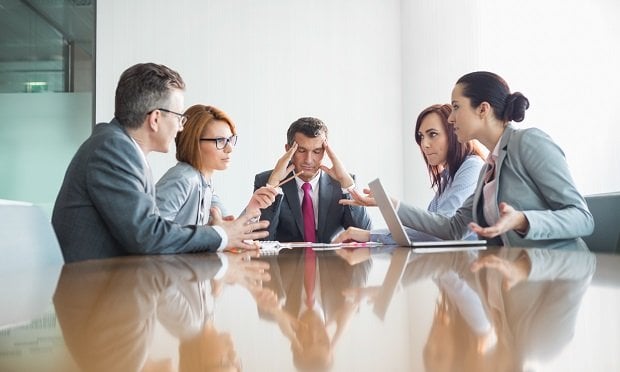 There is great potential for political discussions to lead to disagreements that could invite inflammatory comments or negative treatment in the workplace. (Photo: Shutterstock)