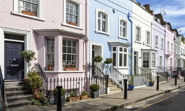 A row of multi-colored terrace houses in Chelsea, London, U.K. (Photo: iStock)
