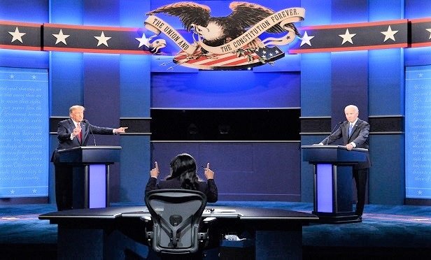 President Donald Trump (left) debates Joe Biden, the 2020 Democratic presidential nominee, on Oct. 23 in Nashville, Tennessee. (Photo: Kevin Dietsch/UPI/Bloomberg)
