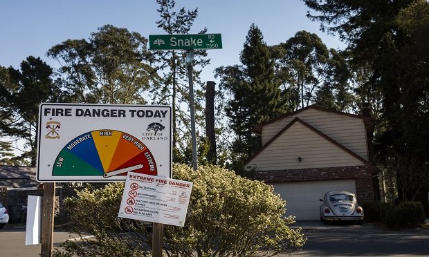 A sign warns of elevated fire danger in the Oakland Hill area of Oakland, California, U.S., on Thursday, Oct. 29. 2020. (Photo: Philip Pacheco/Bloomberg)