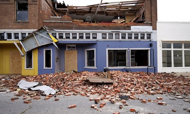As severe weather increases, thoughtfully and confidently navigating its frequency, severity and damage is critical in assuring the right insurance protection for every policyholder. Here, debris is seen near a business in Lake Charles, La., in the aftermath of Hurricane Laura. (AP Photo/Gerald Herbert)