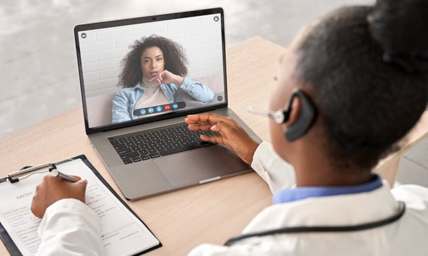 Below are what health care industry clients need to know regarding the increased use of telemedicine and professional liability risks. (Photo: insta_photos/Shutterstock)