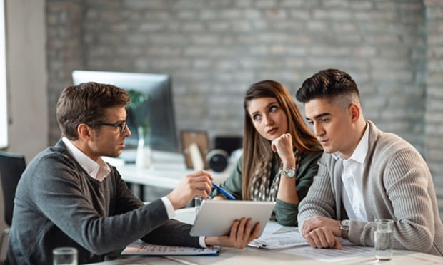 Post-sale, agents handle important touchpoints for policyholders, such as reviewing coverages, renewal decisions and helping with claims when there is a loss. (Credit: Drazen Zigic/Shutterstock) 