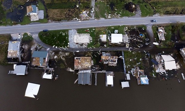 Homes destroyed and submerged in water after Hurricane Ida near Chauvin, Louisiana, on Sept. 1. Photographer: Mark Felix/Bloomberg