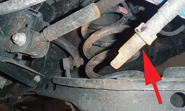 Automobile tie rod failure.