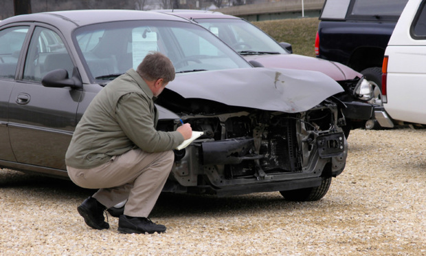 This week's coverage Q&A reviews auto liability deductibles and legal expenses.(Credit: Digiphoto/iStockphoto.com) 