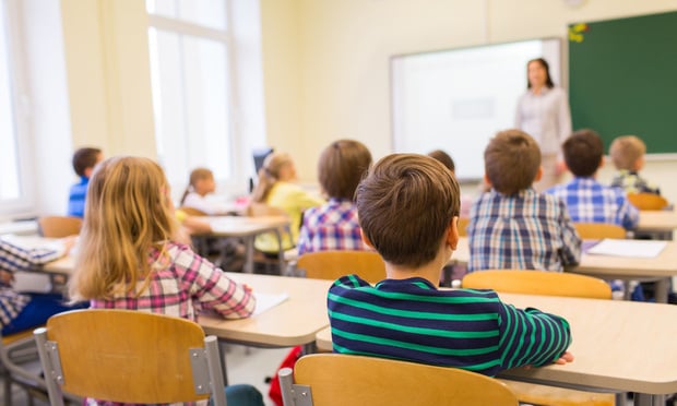 A Palm Beach County School teacher who was injured in a classroom fall after trying to stand up while his leg was asleep is not eligible for workers' compensation, Florida's First District Court of Appeals said Wednesday, upholding a lower court judge's denial of claims. (Credit: Syda Productions/Shutterstock.com)