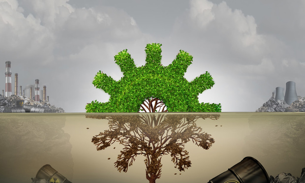 An illustration depicting a thriving environment on top, then a dead environment on the bottom, seemingly due to pollution. Toxic waste barrels litter the ground in the bottom part of the illustration. 